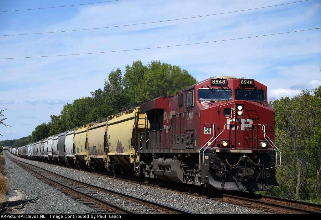 Eastbound manifest cruises down the main